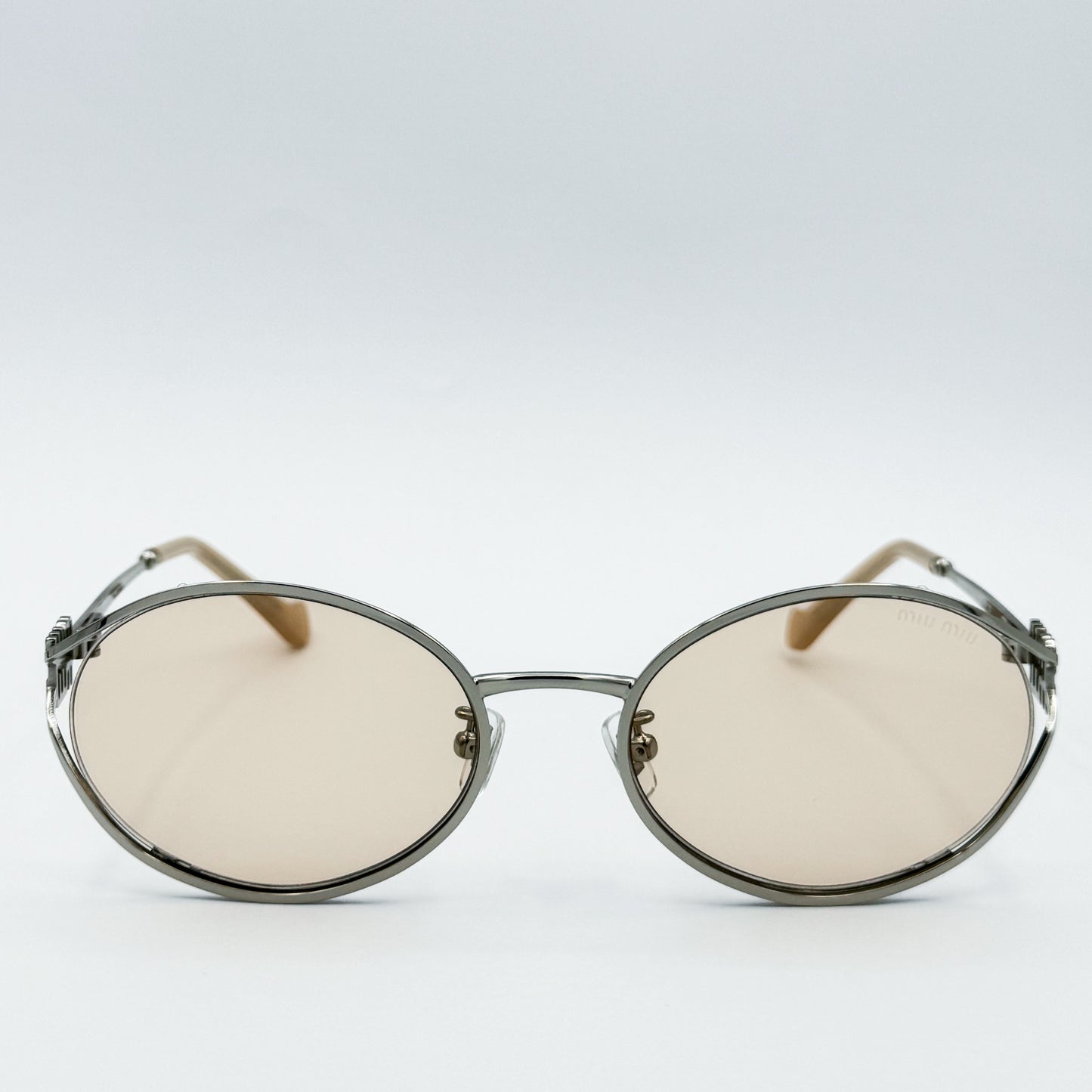 Miu Miu Metal Oval SMU52