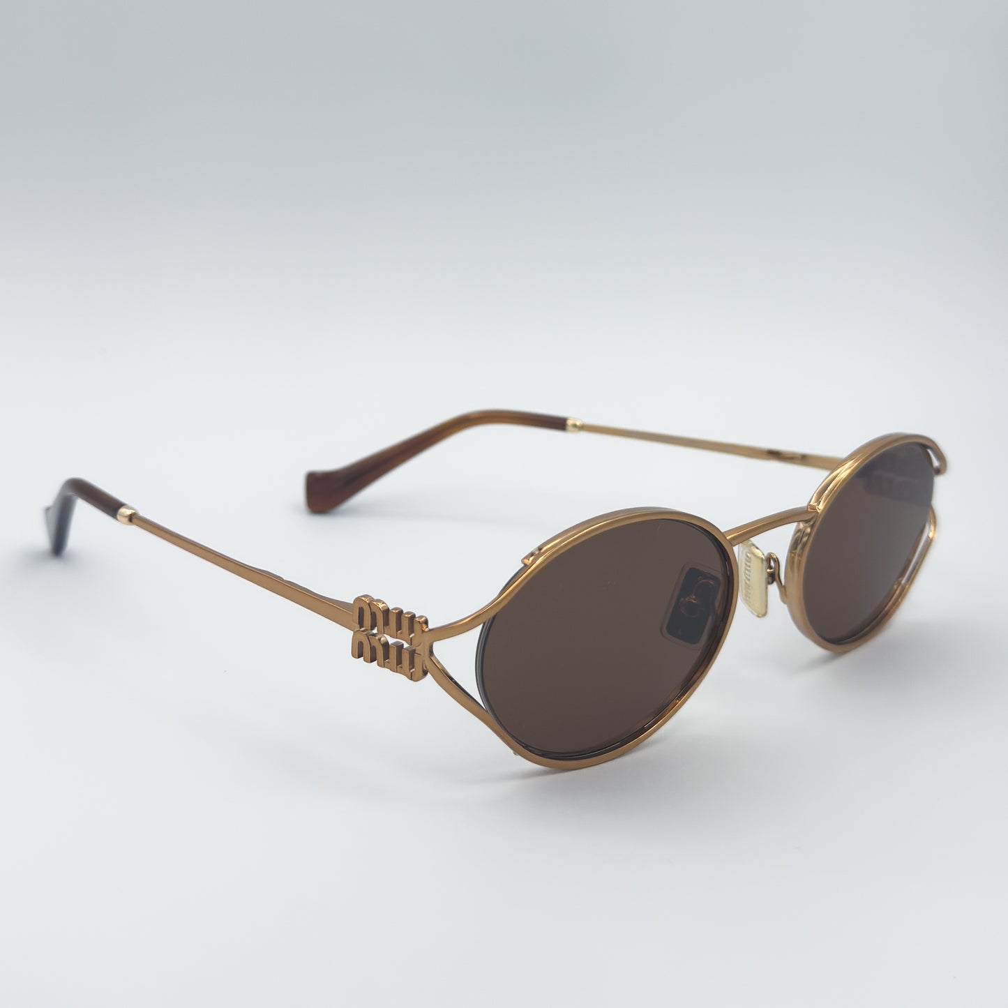 Miu Miu Metal Oval 52YS