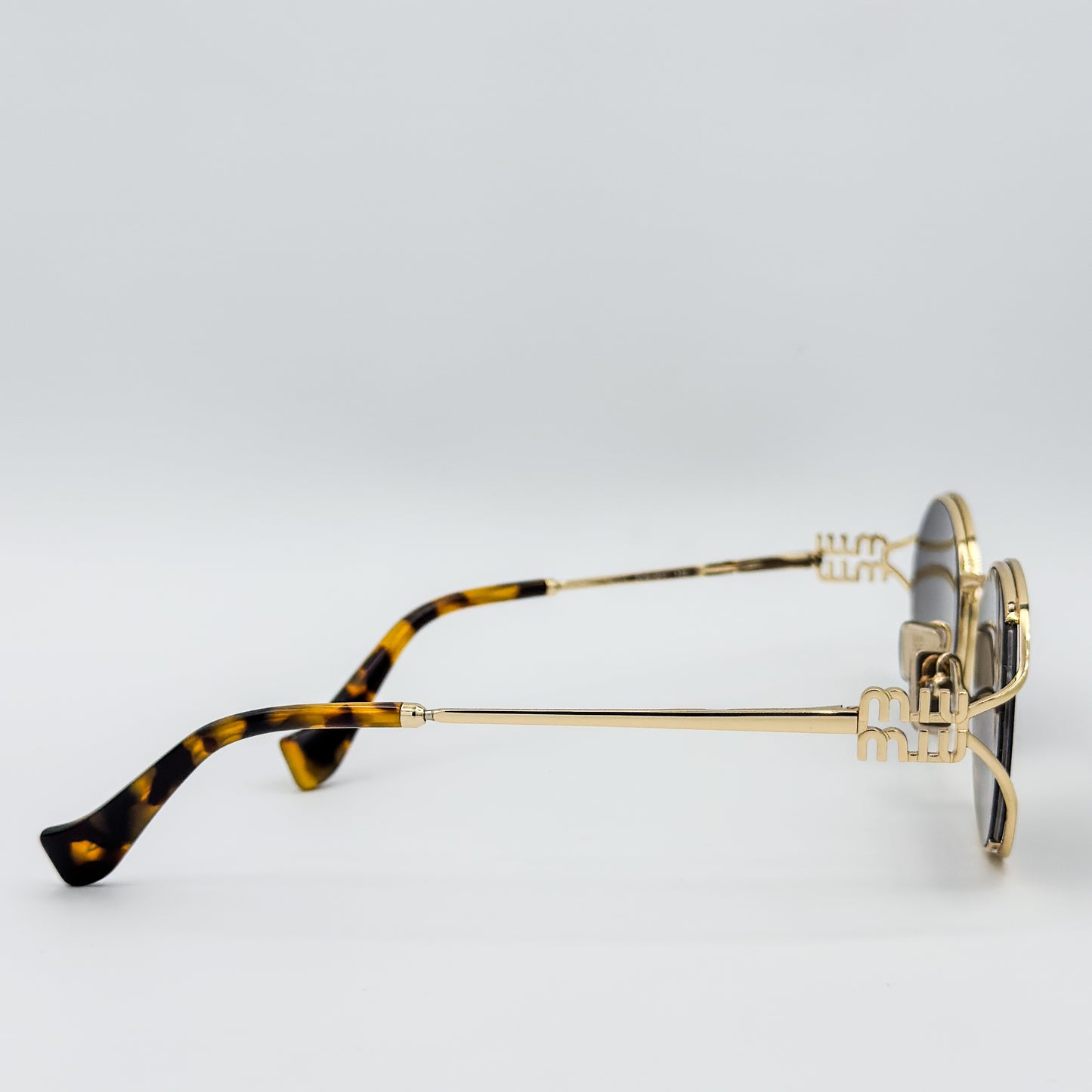 OA Miu Miu Metal Oval 52YS