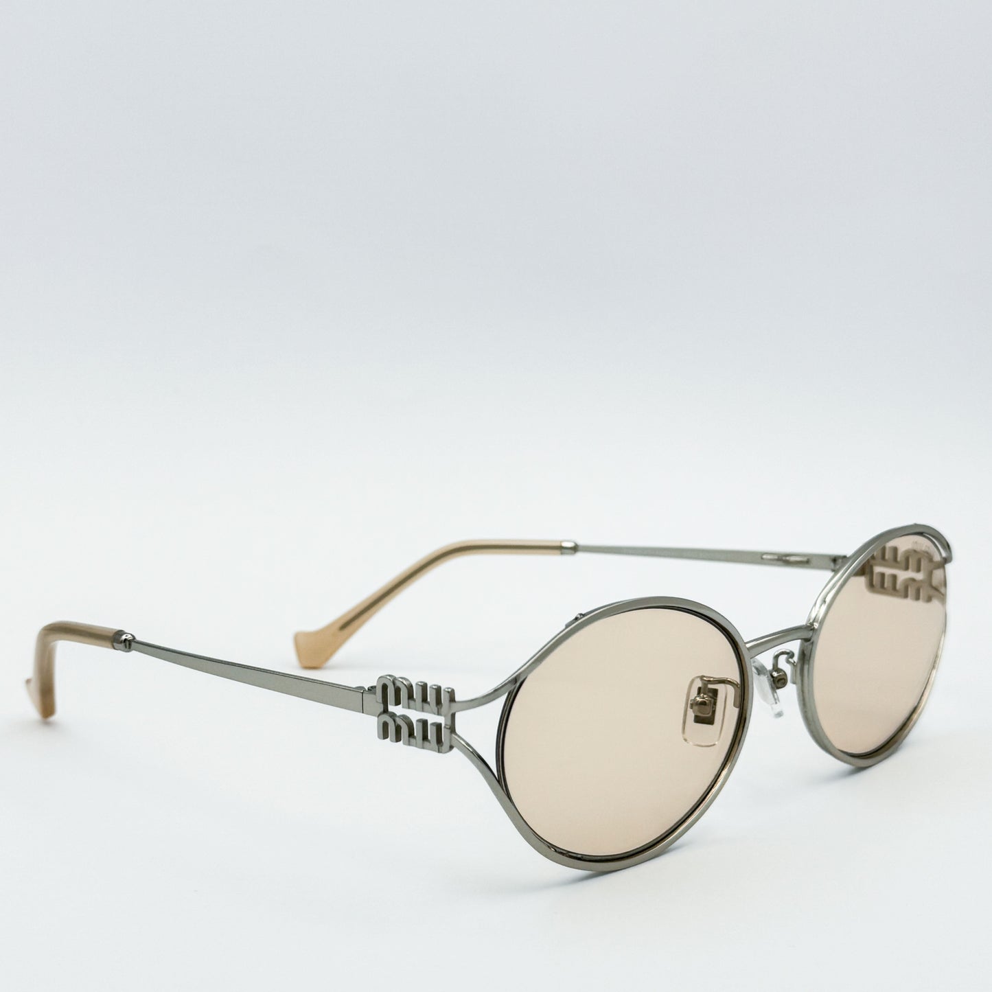Miu Miu Metal Oval SMU52
