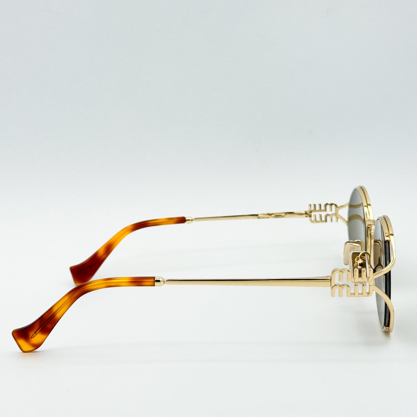 OA Miu Miu Metal Oval 52YS